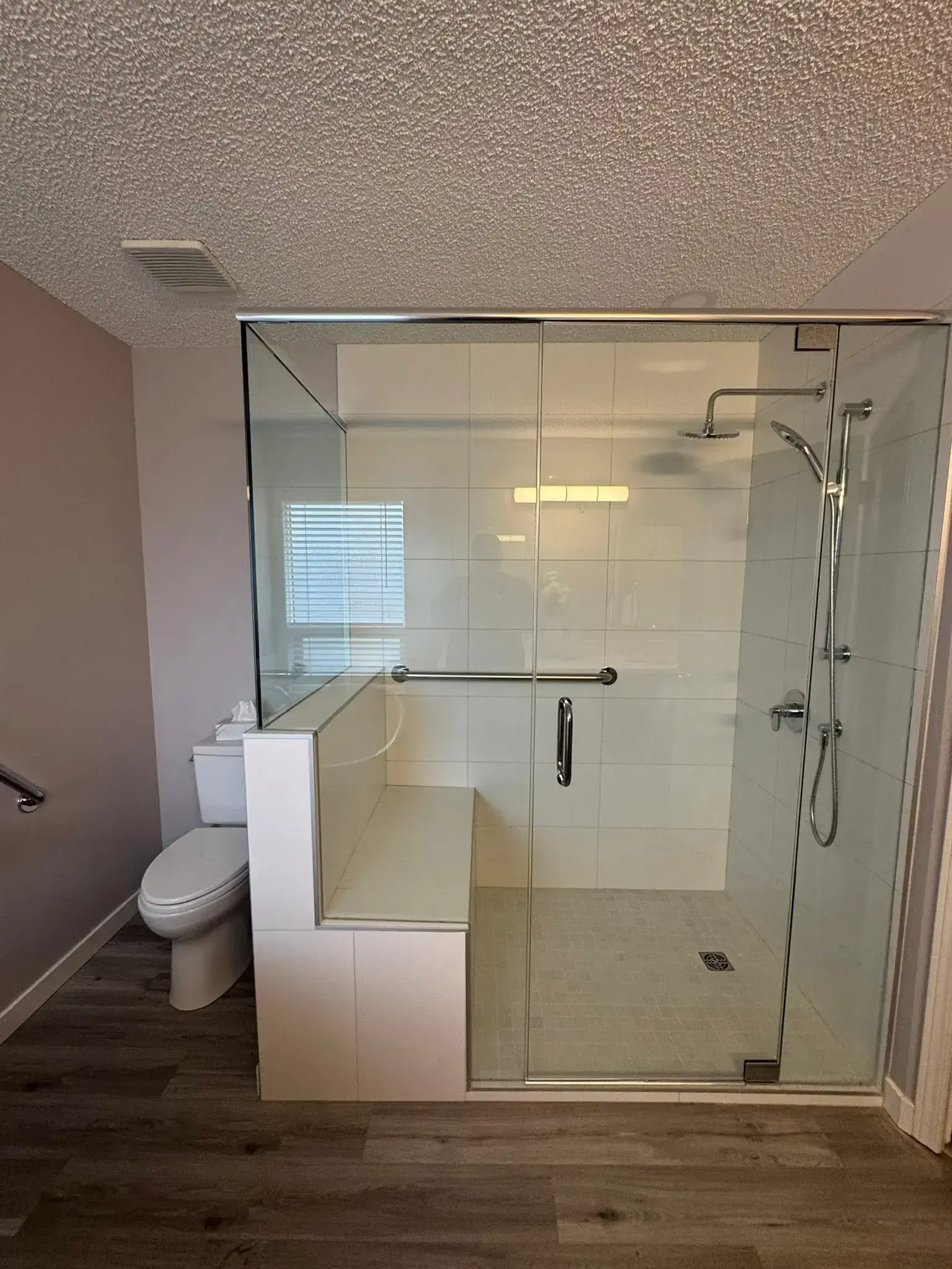 Full bathroom renovation with custom vanity, quartz countertop, and heated floors