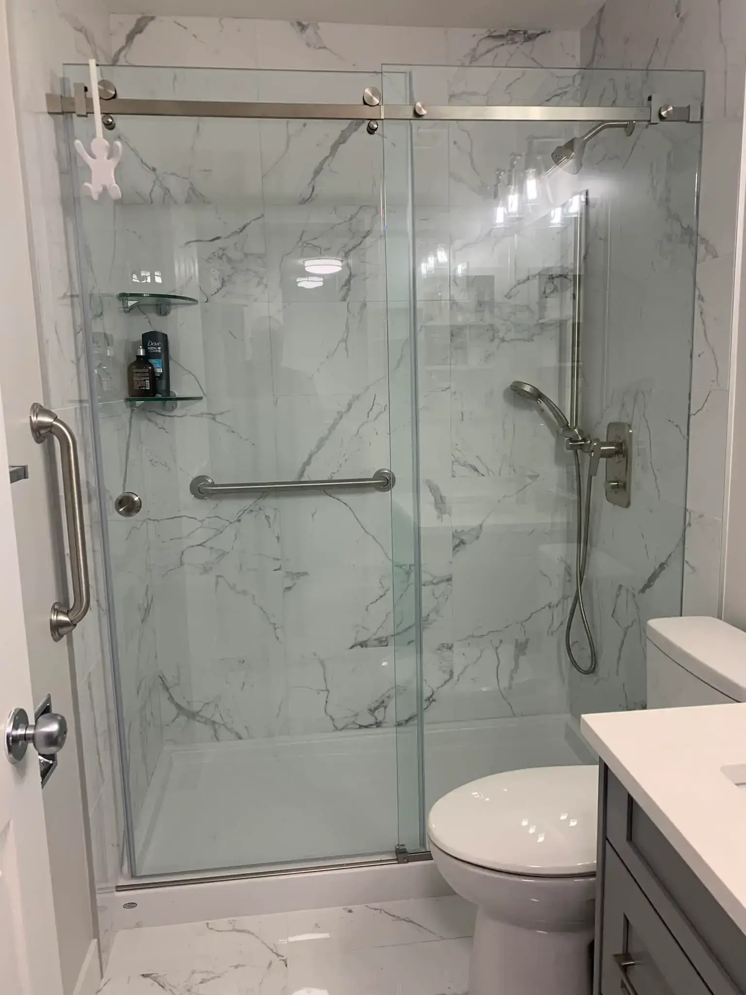 Complete remodel with walk-in shower, bench seating, and premium tile work