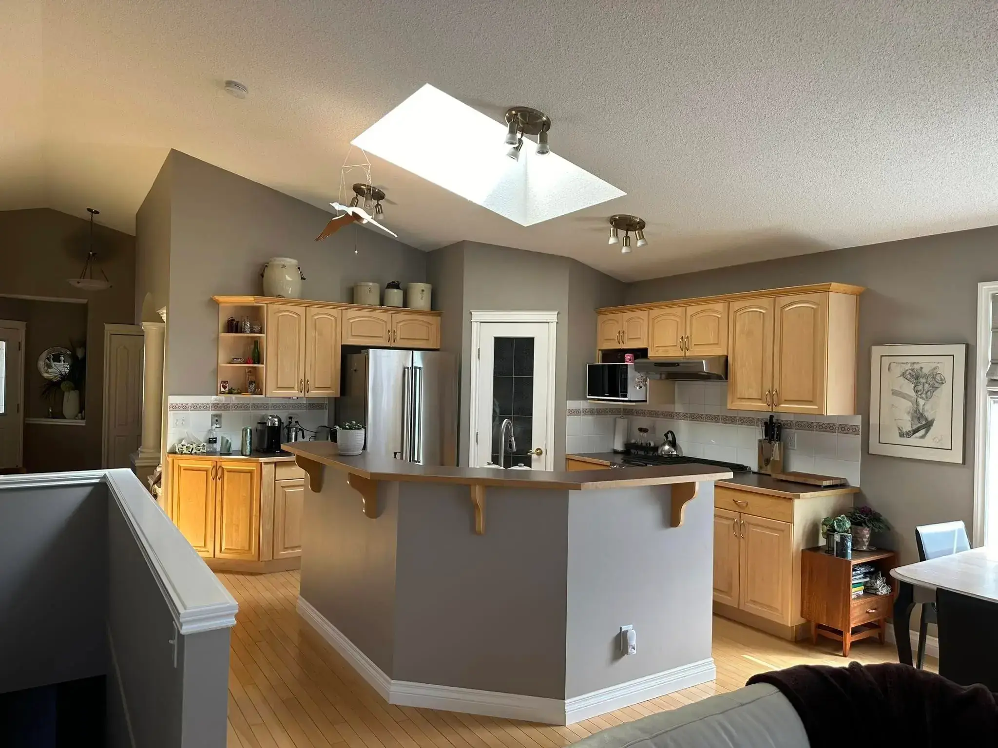 Luxury kitchen with high-end appliances, granite countertops, and custom cabinetry